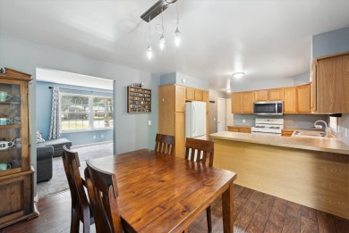 Step into tranquility w/ this stunning 3-bedroom, 1.5-bath home on Lake Monterey Golf Club in Michigan - for sale on GolfHomes.com, golf home, golf lot