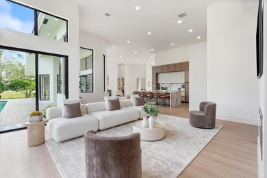 RARELY AVAILABLE COMPLETELY REMODELED CONTEMPORARY SINGLE FAMILY on Breakers Rees Jones Course in Florida - for sale on GolfHomes.com, golf home, golf lot