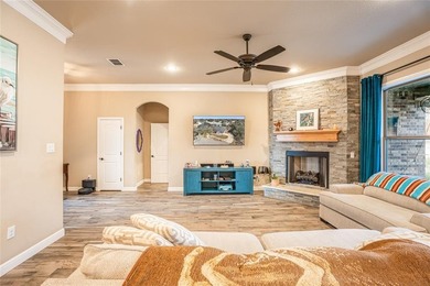 Situated high at the end of a quiet cul-de-sac, this brick and on Pecan Plantation Country Club in Texas - for sale on GolfHomes.com, golf home, golf lot