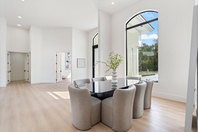 RARELY AVAILABLE COMPLETELY REMODELED CONTEMPORARY SINGLE FAMILY on Breakers Rees Jones Course in Florida - for sale on GolfHomes.com, golf home, golf lot