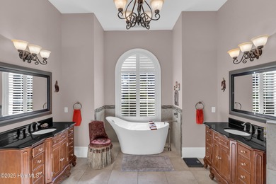 Experience luxury living at its finest in this beautifully on Ocean Ridge Plantation in North Carolina - for sale on GolfHomes.com, golf home, golf lot