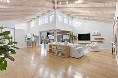 Welcome to this beautifully updated and modern 4-bedroom, 2 on Hamlet Country Club in Florida - for sale on GolfHomes.com, golf home, golf lot