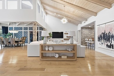 Welcome to this beautifully updated and modern 4-bedroom, 2 on Hamlet Country Club in Florida - for sale on GolfHomes.com, golf home, golf lot