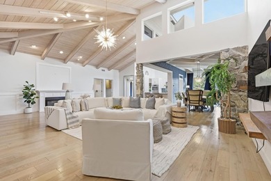 Welcome to this beautifully updated and modern 4-bedroom, 2 on Hamlet Country Club in Florida - for sale on GolfHomes.com, golf home, golf lot