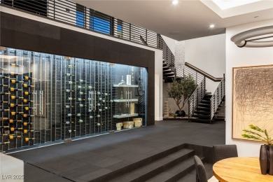 Wow! This ultra-modern FULLY CUSTOM MASTERPIECE offers on Dragon Ridge Country Club in Nevada - for sale on GolfHomes.com, golf home, golf lot