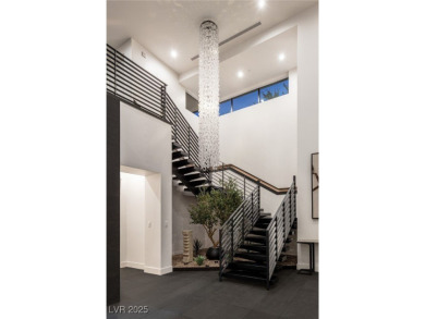 Wow! This ultra-modern FULLY CUSTOM MASTERPIECE offers on Dragon Ridge Country Club in Nevada - for sale on GolfHomes.com, golf home, golf lot