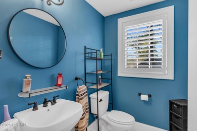 Experience luxury living at its finest in this beautifully on Ocean Ridge Plantation in North Carolina - for sale on GolfHomes.com, golf home, golf lot