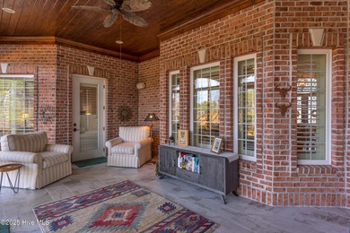 Experience luxury living at its finest in this beautifully on Ocean Ridge Plantation in North Carolina - for sale on GolfHomes.com, golf home, golf lot