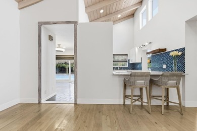 Welcome to this beautifully updated and modern 4-bedroom, 2 on Hamlet Country Club in Florida - for sale on GolfHomes.com, golf home, golf lot