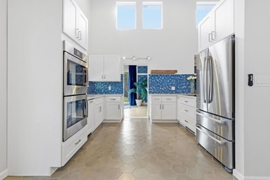 Welcome to this beautifully updated and modern 4-bedroom, 2 on Hamlet Country Club in Florida - for sale on GolfHomes.com, golf home, golf lot