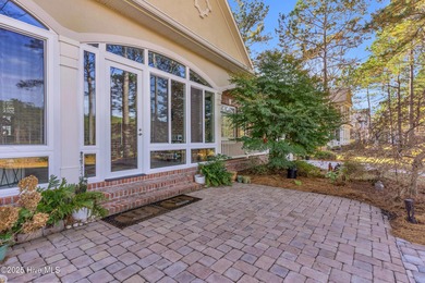 Experience luxury living at its finest in this beautifully on Ocean Ridge Plantation in North Carolina - for sale on GolfHomes.com, golf home, golf lot