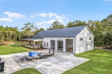 Your spectacular private low country estate on three acres is on Sapelo Hammock Golf Club in Georgia - for sale on GolfHomes.com, golf home, golf lot