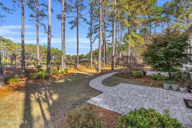 Experience luxury living at its finest in this beautifully on Ocean Ridge Plantation in North Carolina - for sale on GolfHomes.com, golf home, golf lot