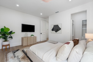 RARELY AVAILABLE COMPLETELY REMODELED CONTEMPORARY SINGLE FAMILY on Breakers Rees Jones Course in Florida - for sale on GolfHomes.com, golf home, golf lot