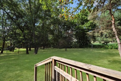 Step into tranquility w/ this stunning 3-bedroom, 1.5-bath home on Lake Monterey Golf Club in Michigan - for sale on GolfHomes.com, golf home, golf lot