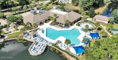 Experience luxury living at its finest in this beautifully on Ocean Ridge Plantation in North Carolina - for sale on GolfHomes.com, golf home, golf lot