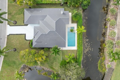 RARELY AVAILABLE COMPLETELY REMODELED CONTEMPORARY SINGLE FAMILY on Breakers Rees Jones Course in Florida - for sale on GolfHomes.com, golf home, golf lot