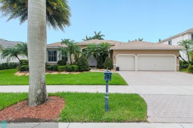 ESPECTACULAR MODERN HOME WITH SMART HOME SONOS SYSTEM, SITUATED on Weston Hills Country Club in Florida - for sale on GolfHomes.com, golf home, golf lot