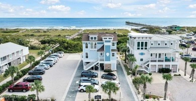 Experience luxury living at its finest in this beautifully on Ocean Ridge Plantation in North Carolina - for sale on GolfHomes.com, golf home, golf lot