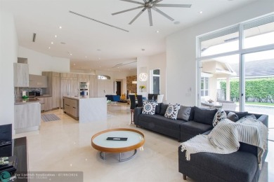 ESPECTACULAR MODERN HOME WITH SMART HOME SONOS SYSTEM, SITUATED on Weston Hills Country Club in Florida - for sale on GolfHomes.com, golf home, golf lot