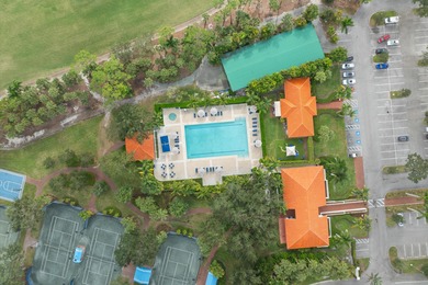 RARELY AVAILABLE COMPLETELY REMODELED CONTEMPORARY SINGLE FAMILY on Breakers Rees Jones Course in Florida - for sale on GolfHomes.com, golf home, golf lot