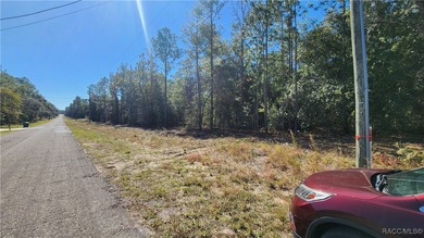 Beautiful homesite on smooth paved road in the growing on Citrus Springs Country Club in Florida - for sale on GolfHomes.com, golf home, golf lot