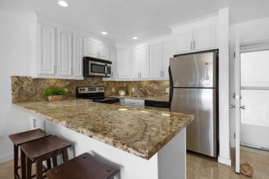 Sleek and modern 1 bedroom/1 bathroom condo with fabulous views on Card Sound Golf Club in Florida - for sale on GolfHomes.com, golf home, golf lot