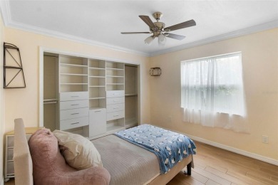 Located on a private corner lot in the highly sought-after on Carrollwood Country Club in Florida - for sale on GolfHomes.com, golf home, golf lot