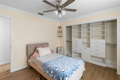 Located on a private corner lot in the highly sought-after on Carrollwood Country Club in Florida - for sale on GolfHomes.com, golf home, golf lot