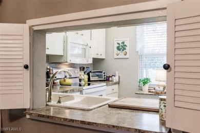 Lovely, well-kept 1st floor unit. Sit in the enclosed lanai on Seven Lakes Golf and Tennis Community in Florida - for sale on GolfHomes.com, golf home, golf lot