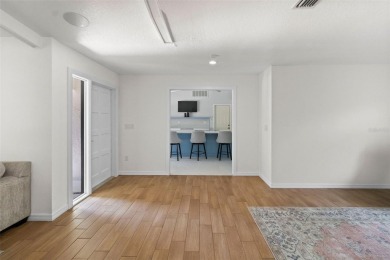 Located on a private corner lot in the highly sought-after on Carrollwood Country Club in Florida - for sale on GolfHomes.com, golf home, golf lot