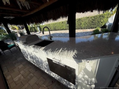 Welcome to this enchanting waterfront & golf-front tiki Lot! on Motorcoach Resort Golf Course in Florida - for sale on GolfHomes.com, golf home, golf lot