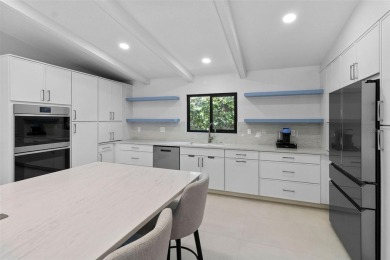 Located on a private corner lot in the highly sought-after on Carrollwood Country Club in Florida - for sale on GolfHomes.com, golf home, golf lot