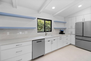 Located on a private corner lot in the highly sought-after on Carrollwood Country Club in Florida - for sale on GolfHomes.com, golf home, golf lot