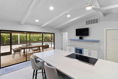 Located on a private corner lot in the highly sought-after on Carrollwood Country Club in Florida - for sale on GolfHomes.com, golf home, golf lot