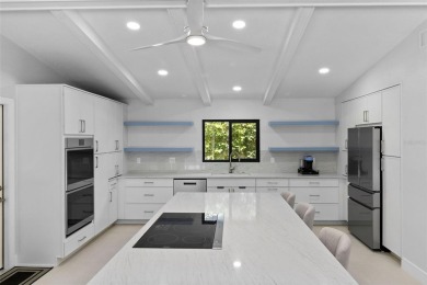 Located on a private corner lot in the highly sought-after on Carrollwood Country Club in Florida - for sale on GolfHomes.com, golf home, golf lot