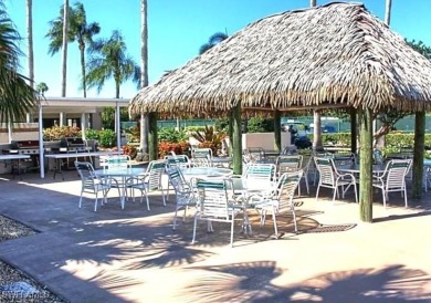 Lovely, well-kept 1st floor unit. Sit in the enclosed lanai on Seven Lakes Golf and Tennis Community in Florida - for sale on GolfHomes.com, golf home, golf lot