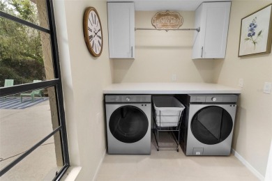 Located on a private corner lot in the highly sought-after on Carrollwood Country Club in Florida - for sale on GolfHomes.com, golf home, golf lot