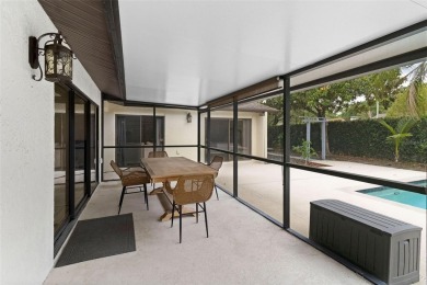Located on a private corner lot in the highly sought-after on Carrollwood Country Club in Florida - for sale on GolfHomes.com, golf home, golf lot