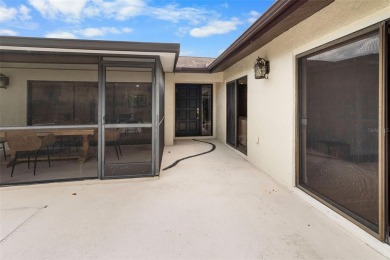 Located on a private corner lot in the highly sought-after on Carrollwood Country Club in Florida - for sale on GolfHomes.com, golf home, golf lot