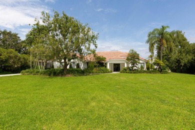 This gorgeous pool home is situated on a larger, 1.13-acre on The Wanderers Club in Florida - for sale on GolfHomes.com, golf home, golf lot