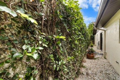 Located on a private corner lot in the highly sought-after on Carrollwood Country Club in Florida - for sale on GolfHomes.com, golf home, golf lot