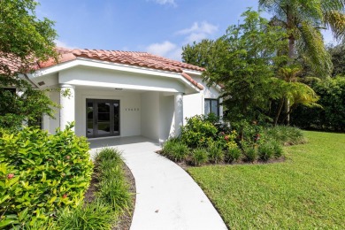 This gorgeous pool home is situated on a larger, 1.13-acre on The Wanderers Club in Florida - for sale on GolfHomes.com, golf home, golf lot