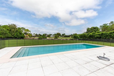 This gorgeous pool home is situated on a larger, 1.13-acre on The Wanderers Club in Florida - for sale on GolfHomes.com, golf home, golf lot