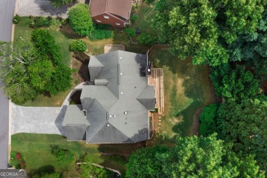 Welcome to this spacious traditional home that offers a blend of on Brookstone Golf and Country Club in Georgia - for sale on GolfHomes.com, golf home, golf lot