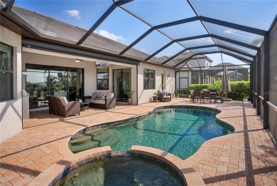 Indulge in the luxury lifestyle offered by this exquisite Napoli on Lakewood National Golf Club in Florida - for sale on GolfHomes.com, golf home, golf lot