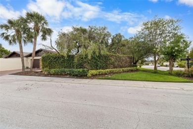 Located on a private corner lot in the highly sought-after on Carrollwood Country Club in Florida - for sale on GolfHomes.com, golf home, golf lot