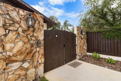 Located on a private corner lot in the highly sought-after on Carrollwood Country Club in Florida - for sale on GolfHomes.com, golf home, golf lot