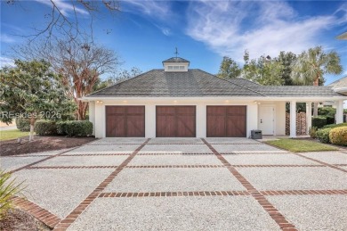 This exclusive property, nestled on one of only 32 deep-water on Colleton River Plantation Club in South Carolina - for sale on GolfHomes.com, golf home, golf lot