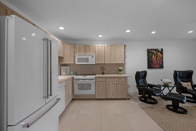 This 2-bedroom, 2-bathroom condo in Angelfish Cay Association #3 on Card Sound Golf Club in Florida - for sale on GolfHomes.com, golf home, golf lot